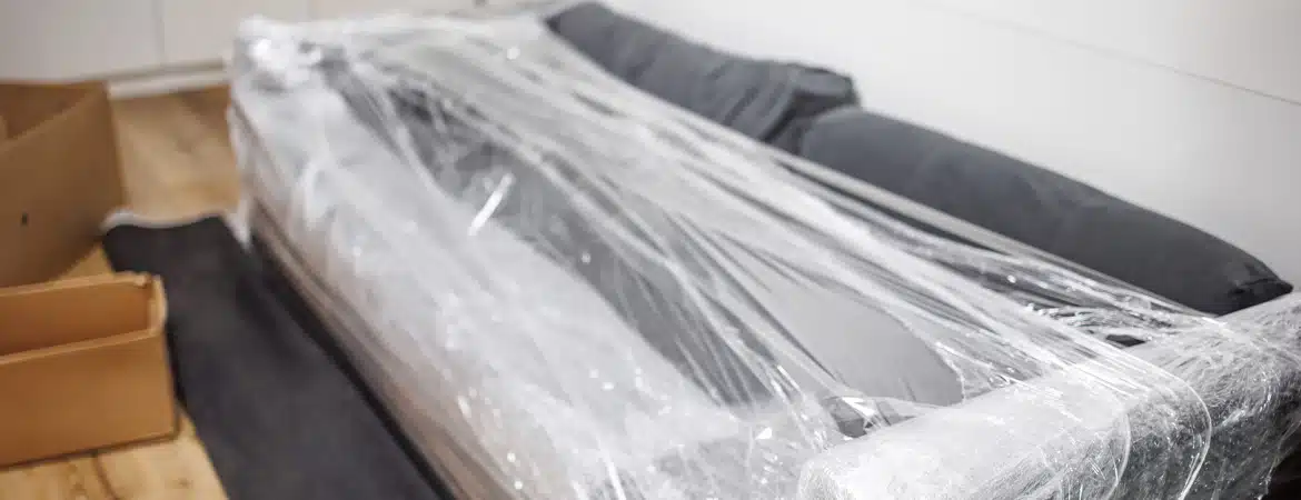 Wrapping sofa in stretch film